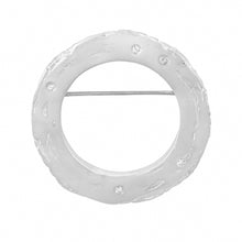 Load image into Gallery viewer, Organic ring shaped silver brooch with square pattern around the edge and white sapphires.