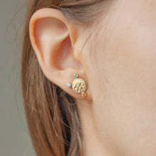 Load image into Gallery viewer, CANON Stud Earrings in 9k gold with diamonds and coloured sapphires with texture on the front on a model | Imprint Collection Margo Orlovik