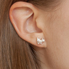 Load image into Gallery viewer, DOT DOT Silver Stud Earring on a model | CØLØNY Collection | Margo Orlovik Contemporary Jewellery