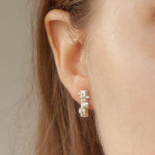 Load image into Gallery viewer, FREE Silver Stud Earring on a model | CØLØNY Collection | Margo Orlovik Contemporary Jewellery