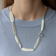 Load image into Gallery viewer, PARAGON ACME II 22 inches silver necklace with clasp visible on a model | Margo Orlovik IMPRINT Collection Contemporary Jewellery