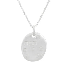 Load image into Gallery viewer, Organic shaped silver pendant with square pattern, on a chain.