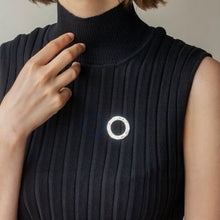 Load image into Gallery viewer, AETHER SILVER BROOCH WITH WHITE SAPPHIRES BY MARGO ORLOVIK ON MODEL
