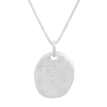 Load image into Gallery viewer, Organic shaped silver pendant with square pattern, on a chain.
